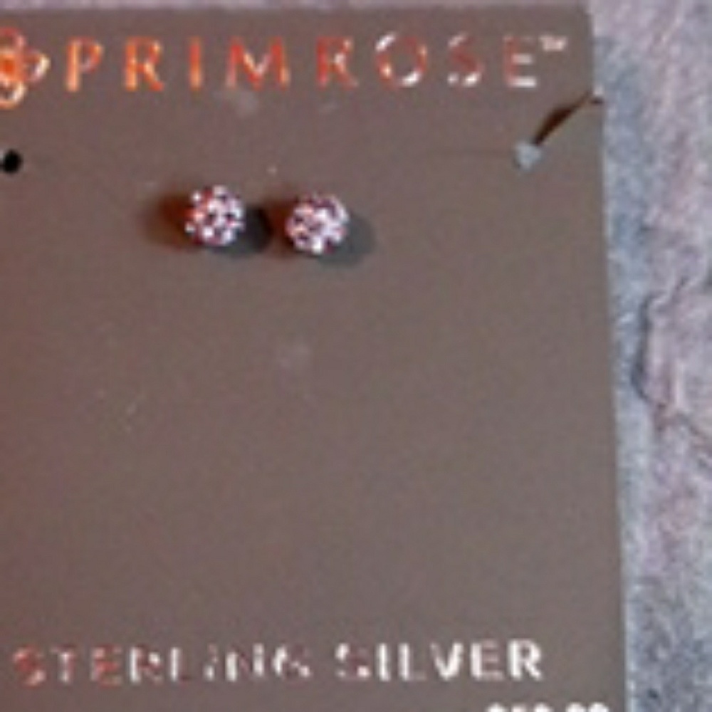 Sterling Silver and CZ. purple ball earrings